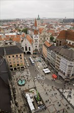 High angle view of buildings with traditional terracotta ceramic tiled rooftops surrounding the