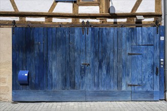 Old blue-painted barn door, Forchheim, Upper Franconia, Bavaria, Germany, Europe