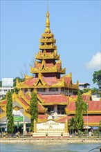 Gold and white wall with welcome greeting Welcome to Union of Myanmar on the shore of the border