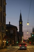 Vester Voldgade, tower, town hall in national romantic style by Martin Nyrop, evening, Copenhagen,