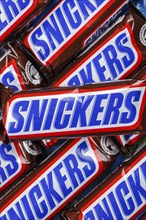 Snickers bar chocolate bar from Mars Inc. as background