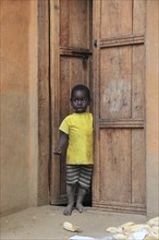 South Ethiopia, Ari people, little boy standing in the front door, Ethiopia, Africa