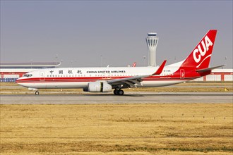 A Boeing 737-800 aircraft of China United Airlines CUA with the registration number B-1148 at