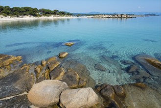 Quiet coast with turquoise water and rocky beach, Karidi beach, Karydi, Vourvourou, Sithonia,