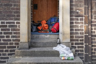 Sleeping place of a homeless person on a staircase of the Kunsthalle Nikolaj, Copenhagen, Denmark,