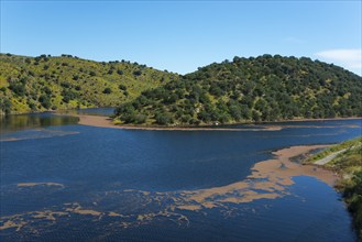 Expansive lake surrounded by wooded hills and clear skies, reservoir, Tagus River, Tagus River,