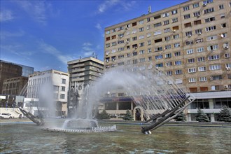 Small Wallachia, city Drobeta Turnu Severin, fountain in front of a building in the city centre,