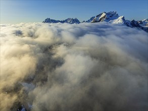 Aerial view, steep mountains, coast, winter, fog, morning light, Moskenesoya, Lofoten, Norway,