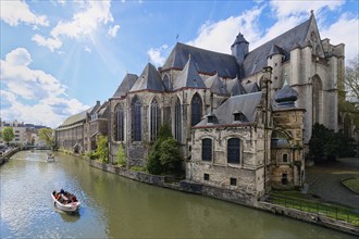 Late gothic Saint Michael Church along the Lys River, Ghent, Flanders, Belgium, Europe