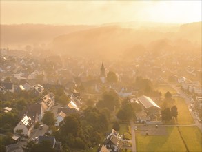 Idyllic village with a church in the midst of summer light and morning atmosphere, Gechingen, Black