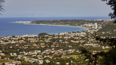 View of the western part of Rhodes Town, coastal town with a wide view of the sea, surrounded by