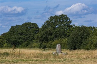 The Karlevi stone is a rune stone and part of a burial site, probably from the Viking Age around