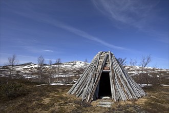 A goahti, kota, a Sami wooden hut on the tundra, Lapland, Sweden, Europe