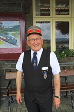 Station master at Ffestiniog and Welsh Highland Railway station, Porthmadog, Gwynedd, north west