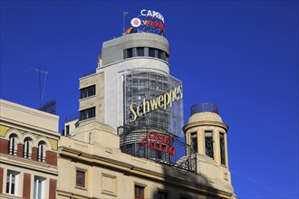 Buildings neon advert signs on Callao plaza square in Madrid city centre, Spain, Europe