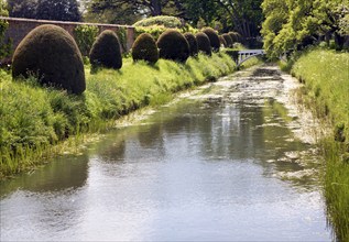 Water in the moat and gardens at Helmingham Hall, Suffolk, England, United Kingdom, Europe