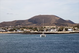 Yacht at moorings in harbour at Corralejo, Fuerteventura, Canary Islands, Spain, Europe