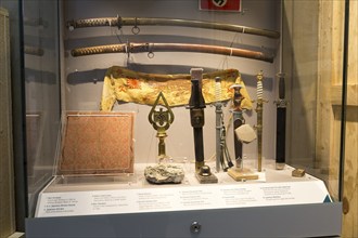 Display cabinet of Second World war trophies from Germany and Japan, REME museum, MOD Lyneham,