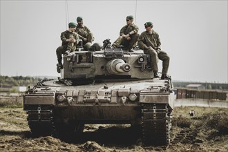 Norwegian soldiers on a Leopard 2 A4 tank, photographed as part of a Bundeswehr exercise with