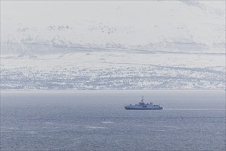 A naval vessel moored in a fjord as part of the NATO exercise Nordic Response near Tromso, 09.03