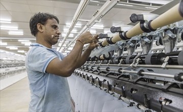 BENIN TEXTILE CORPORATION BENIN. processing cotton in a spinning mill factory near Cotonou in