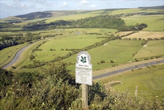 Shallow depth of field Frog Firle National Trust sign, High and Over, near Alfriston, east Sussex,