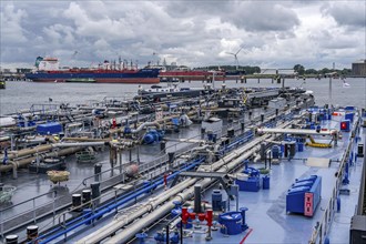 Inland tankers waiting for new cargo, in the petroleum harbour, seaport of Rotterdam, Maasvlakte,