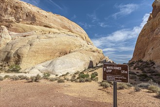 Sign leads hikers through the White Domes Loop trail in Valley of Fire State Park near Overton,