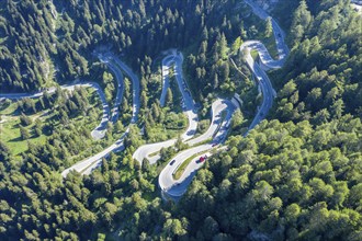 Curves of Majola mountain pass, drone shot, Switzerland, Europe