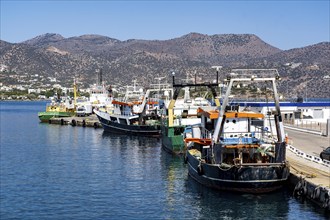 The village of Agios Nikolaos, in the eastern part of Crete, fishing boats in the harbour, Greece,