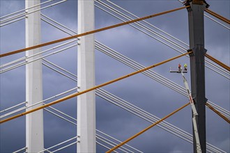 The new Rhine bridge Neuenkamp, the A40, white pillar ropes, and the old motorway bridge, which is