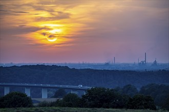 Sunset over the western Ruhr area, Ruhr valley bridge of the A52 motorway between Essen and