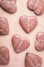 Food wallpaper, chocolate glazed gingerbread, heart-shaped, top view, no people