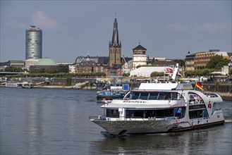 Shipping traffic on the Rhine near Düsseldorf, in front of the old town bank, KD excursion boat