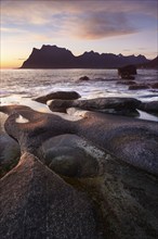 Seascape on the beach at Uttakleiv (Utakleiv), in the foreground stones and the so-called Eye of