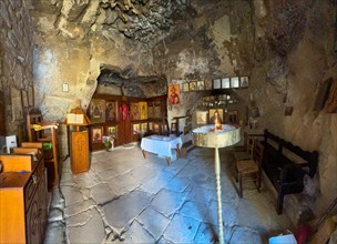 Interior of the small orthodox rock church of Panagia in Matala, Matala, Crete, Greece, Europe