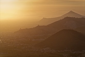 View of the densely populated Neapolitan region and the mountains near Caserta in the hazy light of