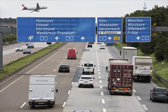 Aircraft from the airport located directly next to the motorway above the traffic on the A5