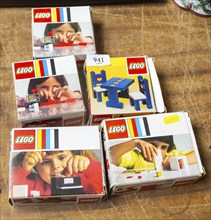 Boxes of Lego toys on display in auction room, UK