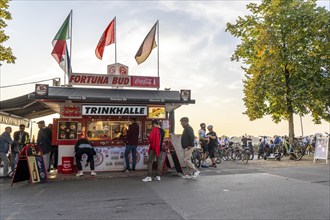 Rhine promenade on Joseph-Beuys-Ufer, view of Oberkassler Bridge, Fortuna Büdchen, kiosk on the