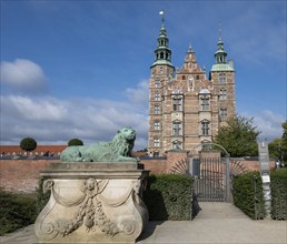 Bronze lion sculpture in front of Rosenborg Palace, 17th century royal palace and museum, Kongens