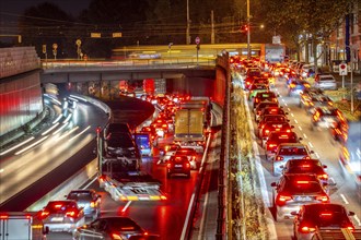 Evening traffic, partly with congestion, slow-moving traffic on the A40 motorway, traffic jam