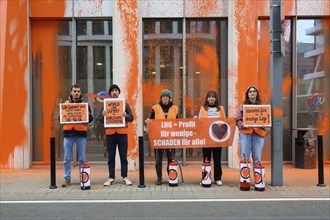 Last Generation activists after colour attack on Total Energies building. They are protesting