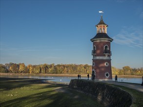 Lighthouse at castle Fasanenschloss, autumn colors, Germany, Europe