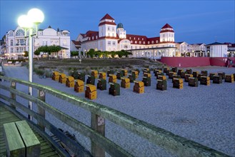 Yellow and green beach chairs in front of the spa hotel in Binz, island of Rügen,