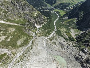 Aerial view, hiking path from La Fouly to Cabane de Neuve along a glacial streams, Valley Val