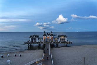 The pier of Sellin, evening mood, sunset, 394 metres long, with restaurant, jetty, beach chairs,