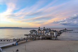 The pier of Sellin, evening mood, sunset, 394 metres long, with restaurant, jetty, beach chairs,