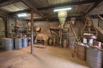 Metal barrels in the bronze powder filling room of a metal powder mill, founded in 1900, Igensdorf,