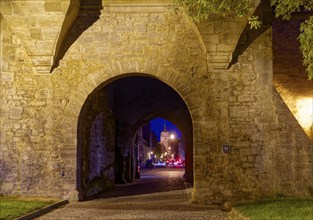 The Galgentor gate illuminated at night on the edge of the old town centre of Rothenburg ob der